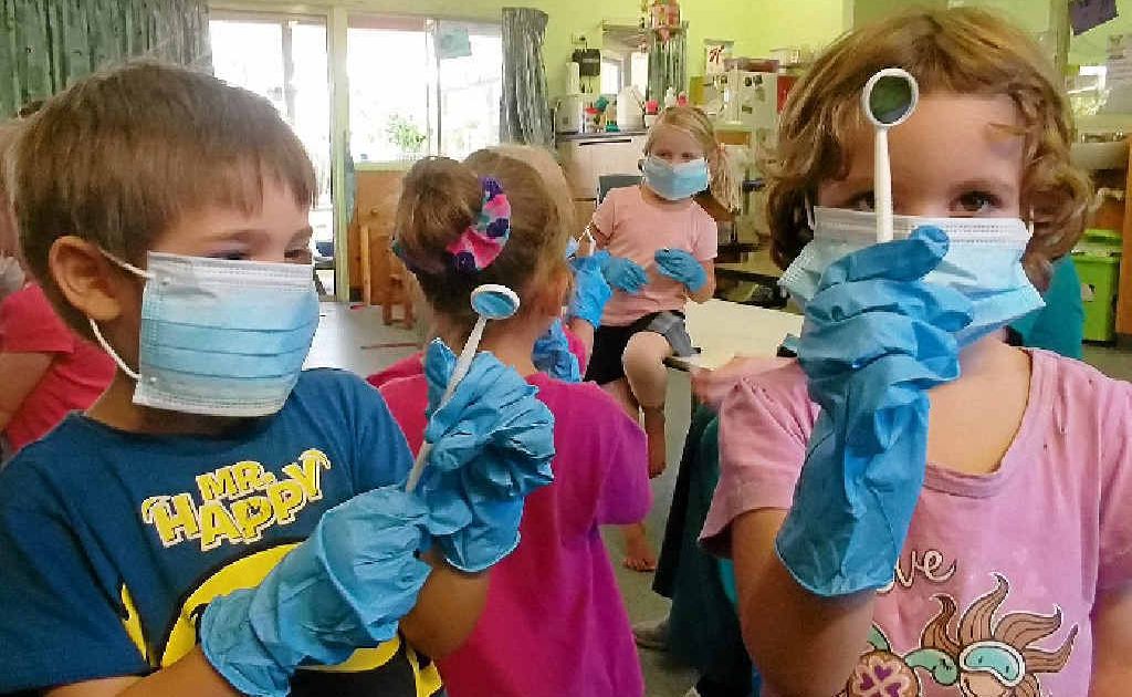 Kile Batts and Jasmine Morrison enjoy the dental role-play experience. Kile Batts and Jasmine Morrison enjoy the dental role-play experience.